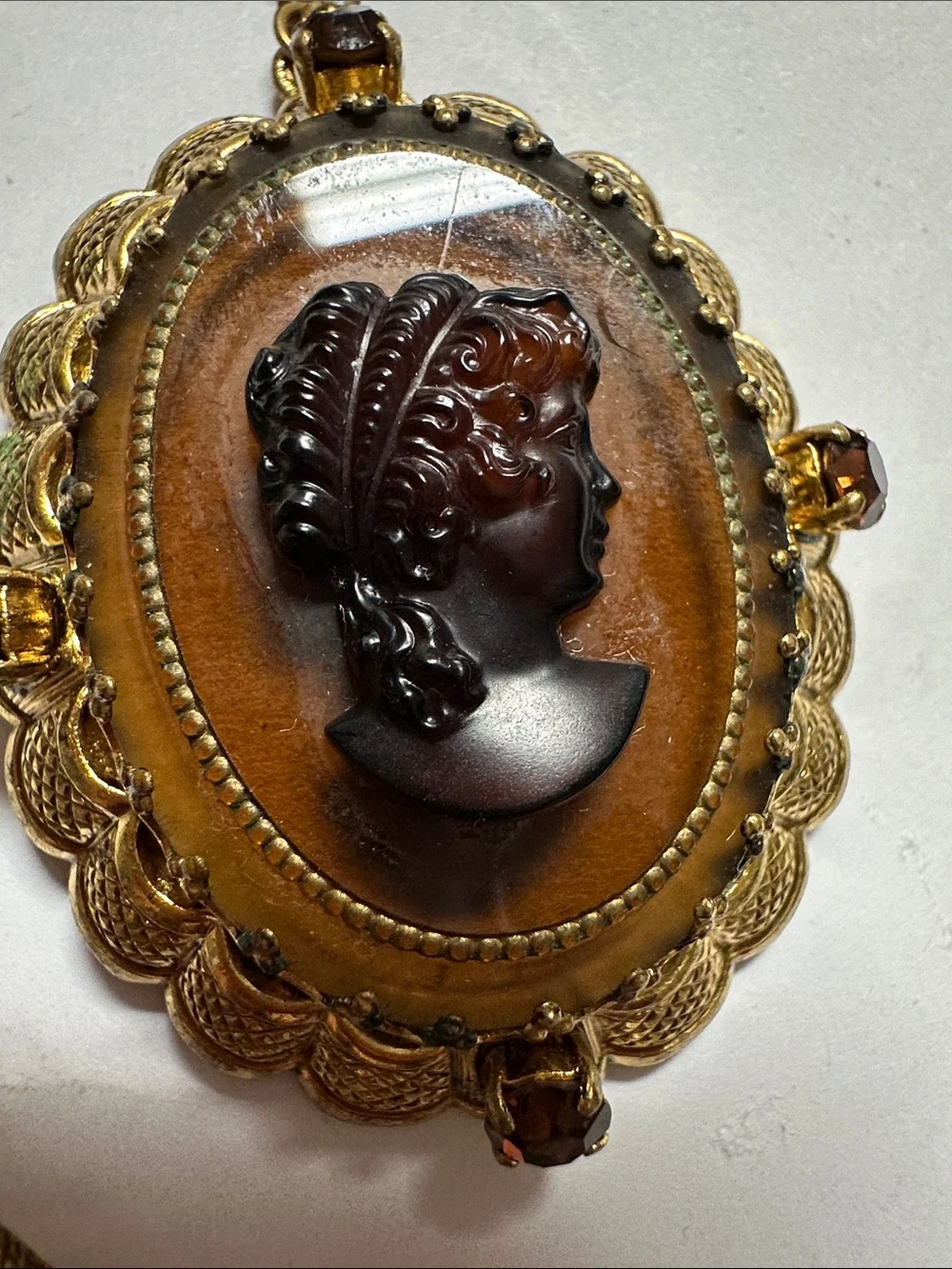 Gold-Tone Amber Cameo Pendant Necklace with Dark Cameo Profile